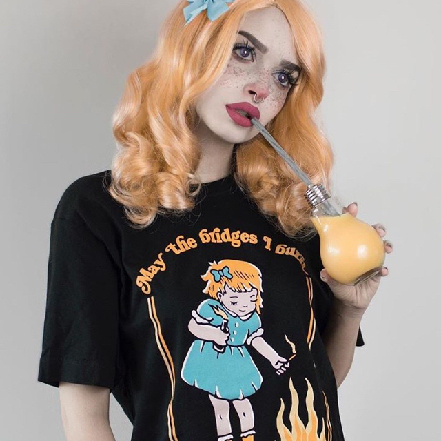 Vivienne Westwood(ヴィヴィアンウエストウッド)の【新作】DISTURBIA CLOTHING わるい女の子 T レディースのトップス(Tシャツ(半袖/袖なし))の商品写真