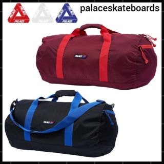 シュプリーム(Supreme)のPALACE Tube Packer Beet Red(ドラムバッグ)