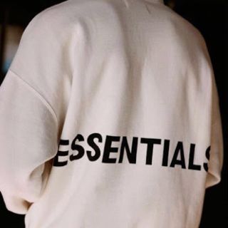 フィアオブゴッド(FEAR OF GOD)の新品未開封 Mサイズ FOG essentials パーカー cream(パーカー)