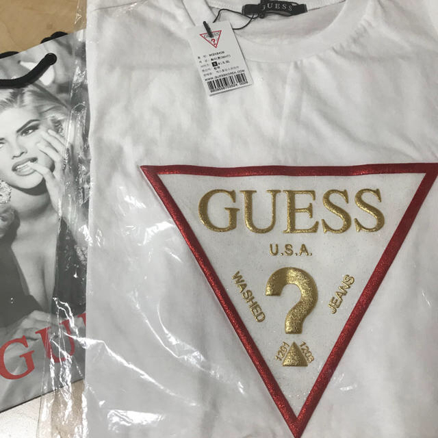 GUESS(ゲス)のGUESS✩ゴールドラメ ユニセックス 紙袋 メンズのトップス(Tシャツ/カットソー(半袖/袖なし))の商品写真