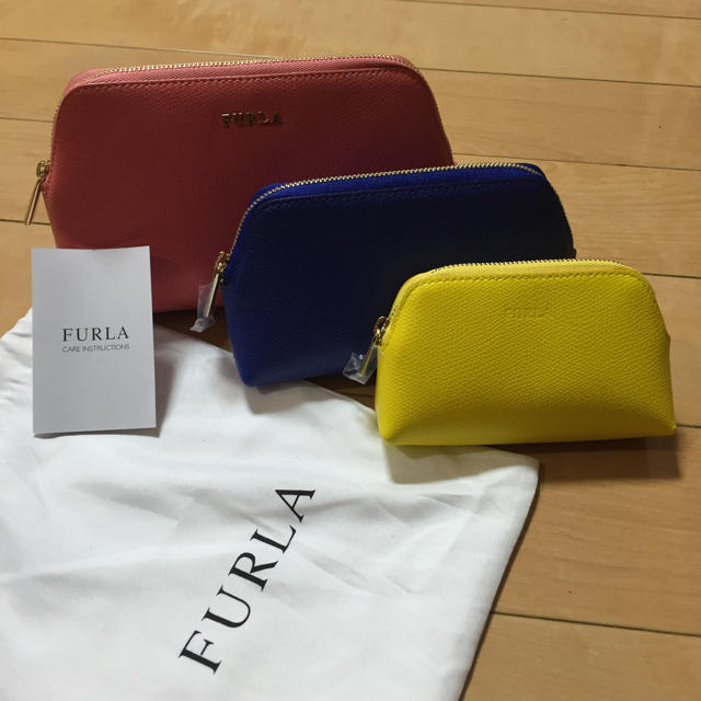 Furla(フルラ)のきゃん様専用新品FURLA3連ポーチ レディースのファッション小物(ポーチ)の商品写真