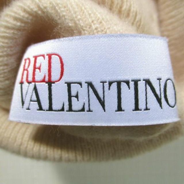 RED VALENTINO(レッドヴァレンティノ)のレッドバレンチノ　長袖 タートル　ニット　 ベージュx黒レースリボン　Sサイズ レディースのトップス(ニット/セーター)の商品写真