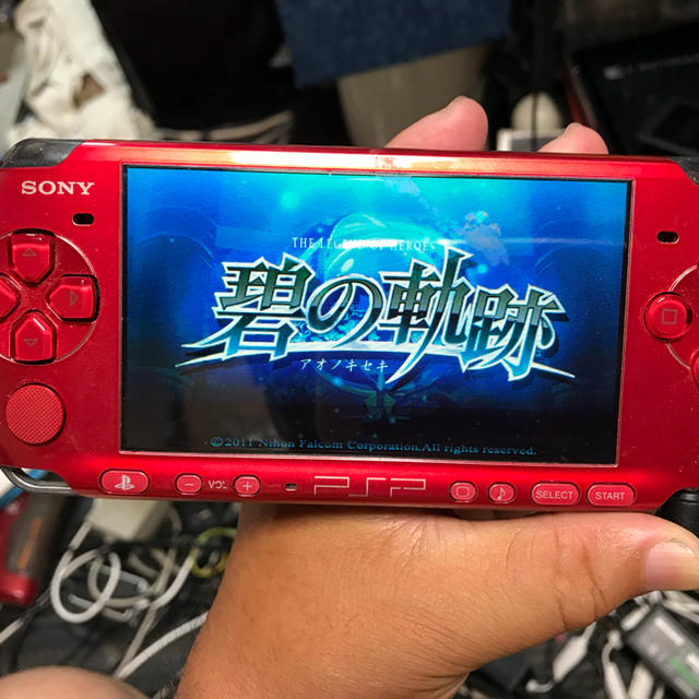 PlayStation Portable(プレイステーションポータブル)のソニー・ＰＳＰ-３０００！レッド！ エンタメ/ホビーのゲームソフト/ゲーム機本体(携帯用ゲーム機本体)の商品写真