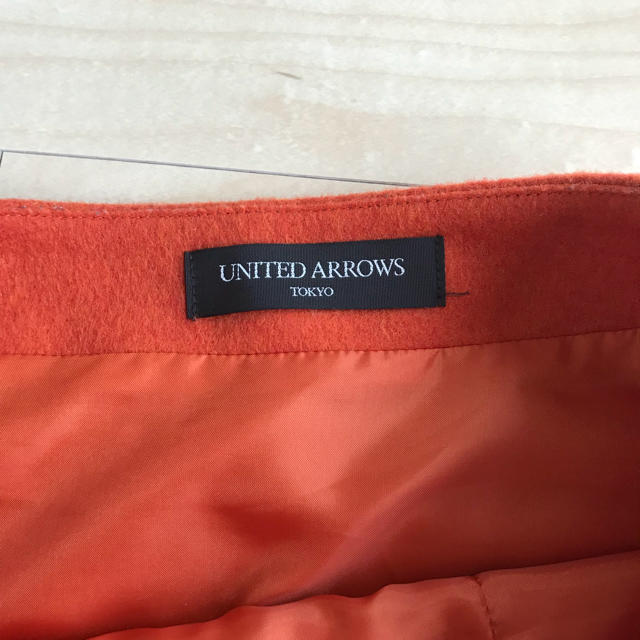 UNITED ARROWS(ユナイテッドアローズ)のユナイテッドアローズ オレンジスカート レディースのスカート(ひざ丈スカート)の商品写真