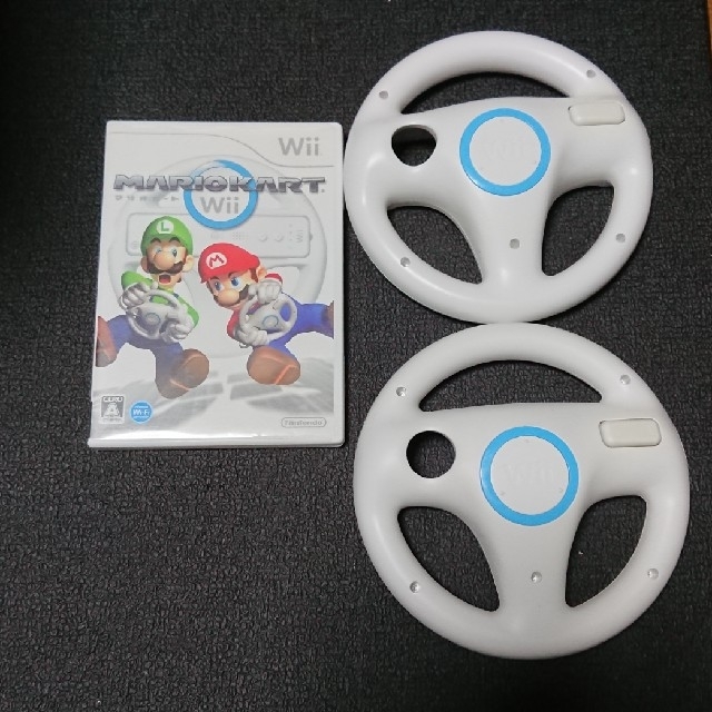 Wii(ウィー)のasa様専用 マリオカート ハンドル2個付き Wii エンタメ/ホビーのゲームソフト/ゲーム機本体(家庭用ゲームソフト)の商品写真
