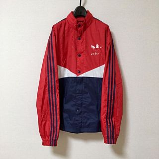 アディダス(adidas)のadidasウィンドブレーカー トリコロール (アディダス ウインドブレーカー)(ナイロンジャケット)