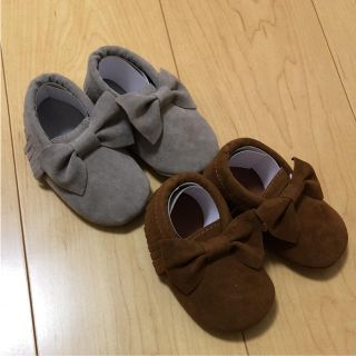 アグ(UGG)の新品♦︎ベビーシューズ♦︎リボンモカシン♦︎フリンジミネトンカ(フラットシューズ)