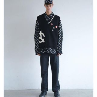 ラフシモンズ(RAF SIMONS)のOY 韓国 ニットベスト 人気 rafsimos 黒売り切れ 白のみ販売(ニット/セーター)