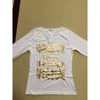 コルザ(COLZA)のタグ付き新品！！ゴールドの英字柄白Tシャツ   Lサイズ(Tシャツ(長袖/七分))