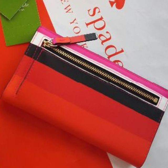 kate spade new york(ケイトスペードニューヨーク)の薄型姫ケイトスペード長財布ピンク赤白黒カラフル色鮮やかストライプ春夏ボーダー牛革 レディースのファッション小物(財布)の商品写真