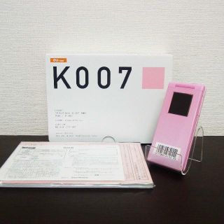 エーユー(au)の新品未使用 au 携帯電話 京セラ(K007)フラワーペタル(携帯電話本体)