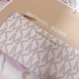 マイケルコース(Michael Kors)のマイケルコース MK総ロゴ バニラベージュ×キャメル☆ スリム長財布 新品(財布)