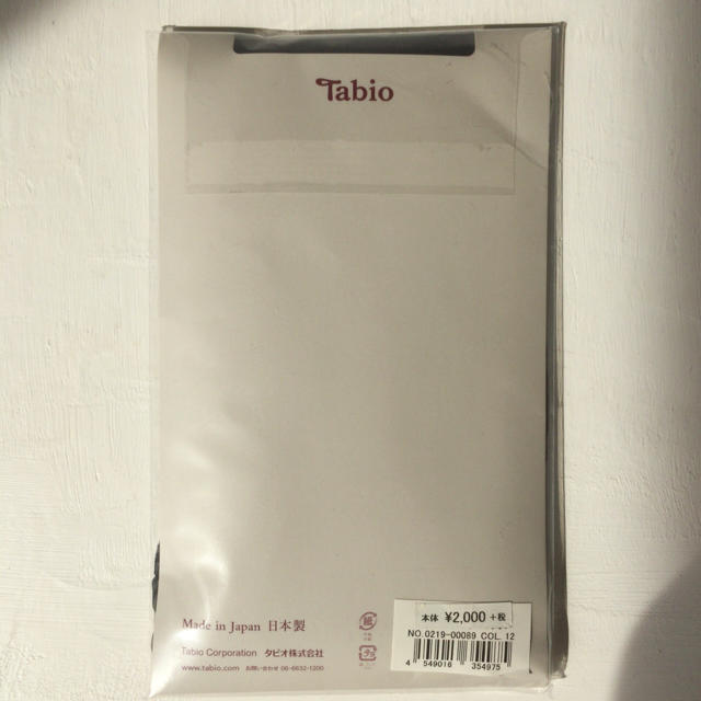 靴下屋(クツシタヤ)のyoona様　新品 未使用 靴下屋 Tabio タビオ タイツ 子花柄 ブラック レディースのレッグウェア(タイツ/ストッキング)の商品写真