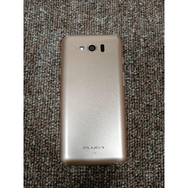 Panasonic(パナソニック)のパナソニック　ELUGA P-03E ゴールド スマホ/家電/カメラのスマートフォン/携帯電話(スマートフォン本体)の商品写真