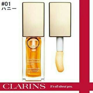 クラランス(CLARINS)の新品 クラランス コンフォートリップオイル 01 ハニー 並行輸入(リップグロス)