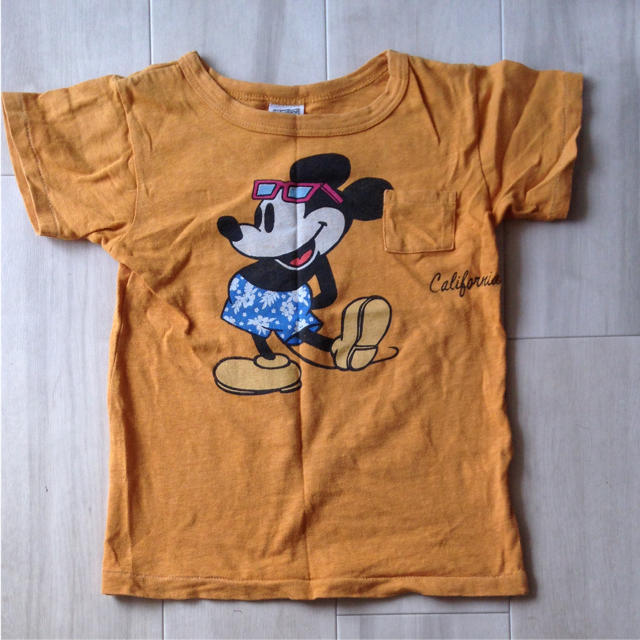 F.O.KIDS(エフオーキッズ)のF.O.Kids DisneyコラボTシャツ 130 オレンジ キッズ/ベビー/マタニティのキッズ服男の子用(90cm~)(Tシャツ/カットソー)の商品写真