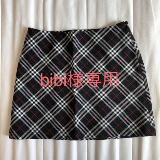 バーバリーブルーレーベル(BURBERRY BLUE LABEL)のBurberryブルーレーベルストレッチ素材の紺×白×赤チェック美品(ミニスカート)