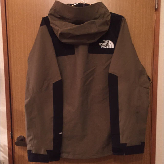 THE NORTH FACE(ザノースフェイス)の新品未使用 ザノースフェイス  マウンテンジャケット ビーチグリーン Mサイズ メンズのジャケット/アウター(マウンテンパーカー)の商品写真