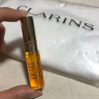 クラランス(CLARINS)の〈値下げ❤︎〉クラランス*リップオイルサンプル×ホワイトポーチ(リップケア/リップクリーム)