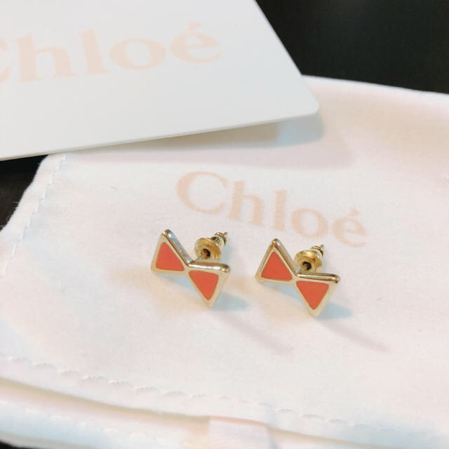 Chloe(クロエ)のエリリン様専用 クロエ　Chloe　ピアス リボン オレンジ レディースのアクセサリー(ピアス)の商品写真