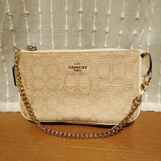 コーチ(COACH)のCOACH　リストレット　シグネチャー　ホワイト/ベージュ(クラッチバッグ)