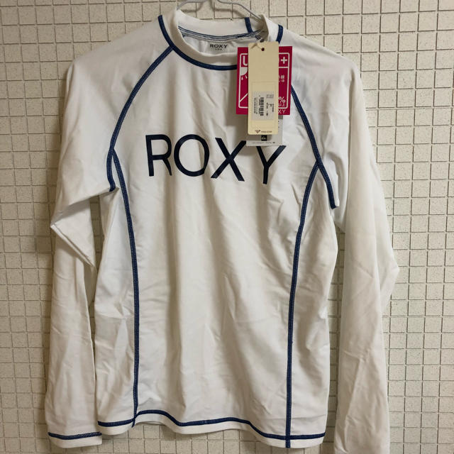 Roxy(ロキシー)のロキシー ラッシュガード 白 L 新品未使用 長袖 レディースの水着/浴衣(水着)の商品写真
