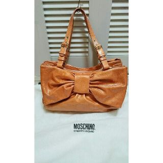 モスキーノ(MOSCHINO)のMOSCHINO モスキーノ オレンジピンクリボンバッグ(ハンドバッグ)