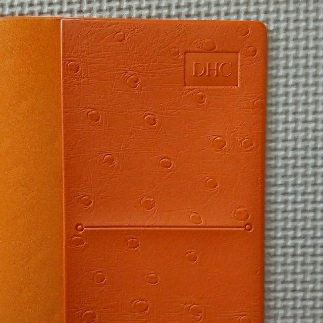 DHC(ディーエイチシー)のブックカバー　ＤＨＣ　オレンジ ハンドメイドの文具/ステーショナリー(ブックカバー)の商品写真