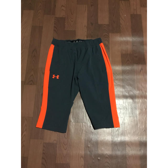 UNDER ARMOUR(アンダーアーマー)のアンダーアーマー XL オレンジ 3/4パンツハーフパンツ ロングパンツ メンズ メンズのパンツ(ショートパンツ)の商品写真