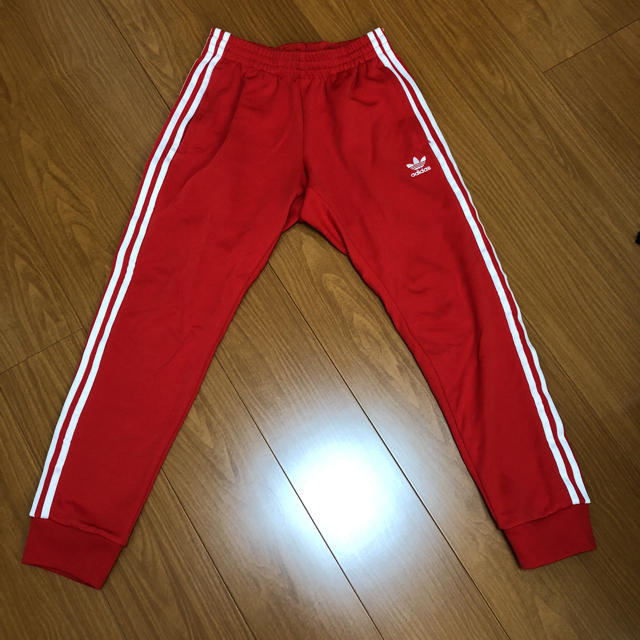 adidas(アディダス)のadidas track pants 赤 red メンズのパンツ(その他)の商品写真