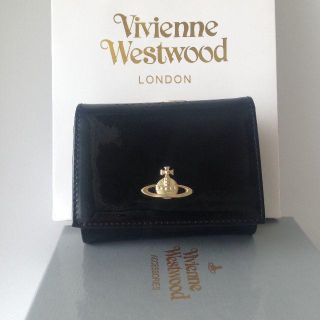 ヴィヴィアンウエストウッド(Vivienne Westwood)のブラック色　ウンドファスナー短財布♣ヴィヴィアンウエストウッド(財布)