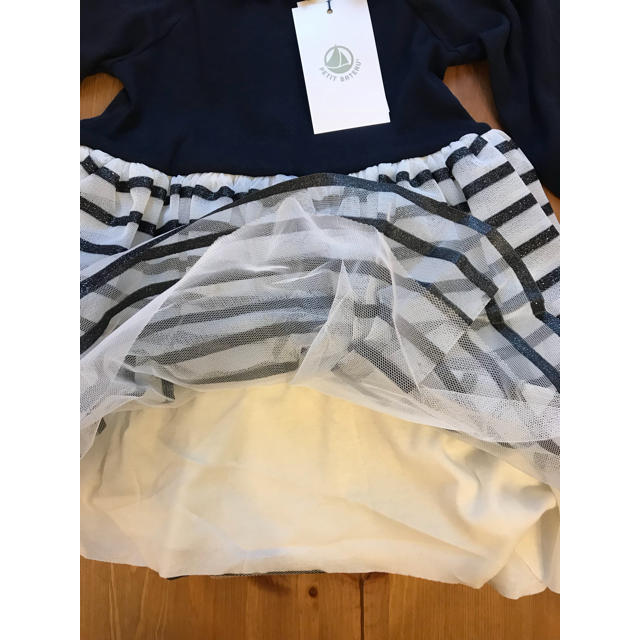 PETIT BATEAU(プチバトー)のMAMIN様専用♡24m プチバトー マリニエールチュール付きワンピース キッズ/ベビー/マタニティのキッズ服女の子用(90cm~)(ワンピース)の商品写真