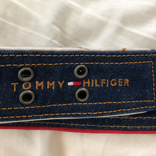 TOMMY HILFIGER(トミーヒルフィガー)のトミーフィルフィガーベルト レディースのトップス(その他)の商品写真