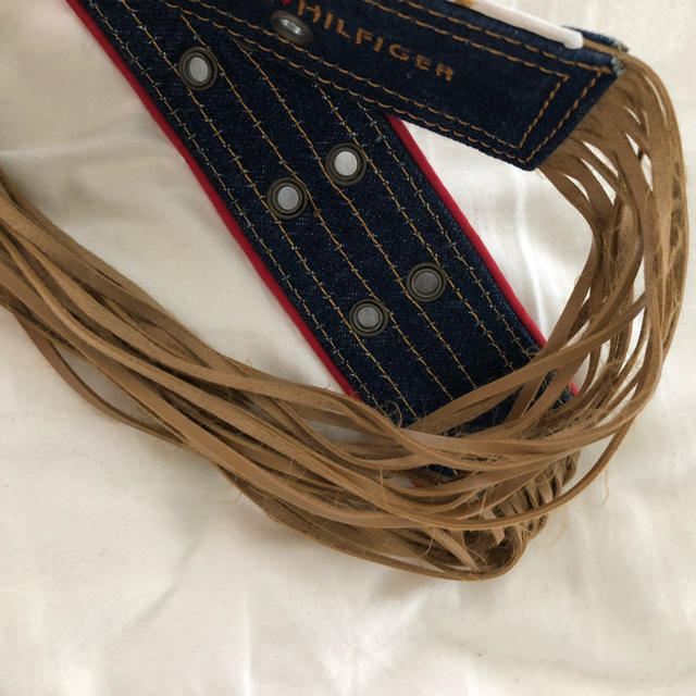 TOMMY HILFIGER(トミーヒルフィガー)のトミーフィルフィガーベルト レディースのトップス(その他)の商品写真