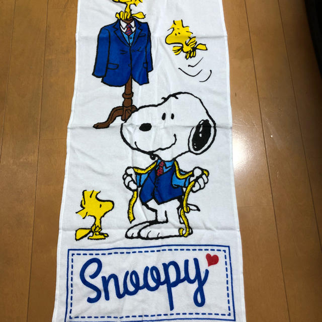 SNOOPY(スヌーピー)の新品 スヌーピー  フェイスタオル エンタメ/ホビーのアニメグッズ(タオル)の商品写真