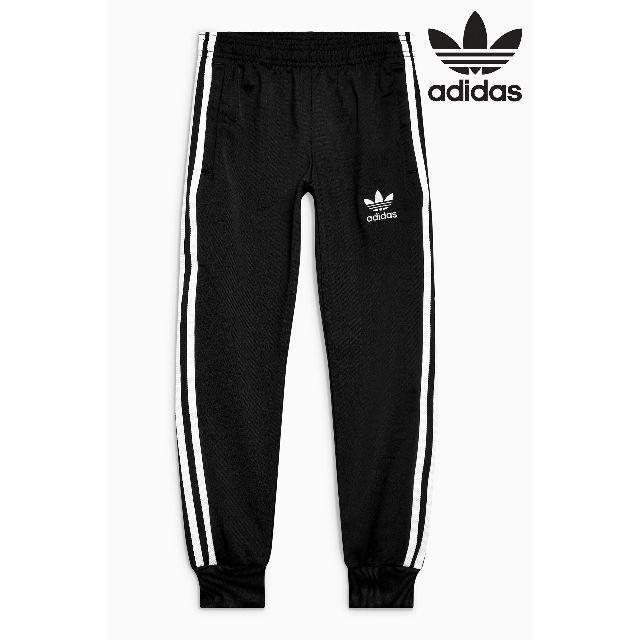 adidas(アディダス)のUK10-11 ブラック adidas originals トラックパンツ  キッズ/ベビー/マタニティのキッズ服男の子用(90cm~)(パンツ/スパッツ)の商品写真