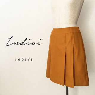 インディヴィ(INDIVI)のインディヴィ☆ウール台形タックスカート(ひざ丈スカート)