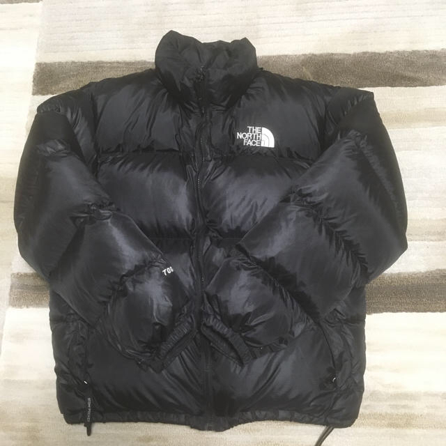 THE NORTH FACE(ザノースフェイス)のノースフェイスヌプシ。黒。とても美品。 L。700フィル。ストウポケット。 メンズのジャケット/アウター(ダウンジャケット)の商品写真