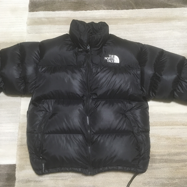 THE NORTH FACE(ザノースフェイス)のノースフェイスヌプシ。黒。とても美品。 L。700フィル。ストウポケット。 メンズのジャケット/アウター(ダウンジャケット)の商品写真