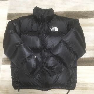 ザノースフェイス(THE NORTH FACE)のノースフェイスヌプシ。黒。とても美品。 L。700フィル。ストウポケット。(ダウンジャケット)