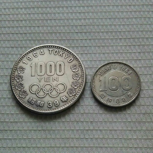 東京オリンピック記念硬貨 1000円・100円 エンタメ/ホビーの美術品/アンティーク(貨幣)の商品写真