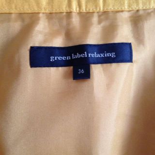 ユナイテッドアローズグリーンレーベルリラクシング(UNITED ARROWS green label relaxing)の黄色スカート(ミニスカート)