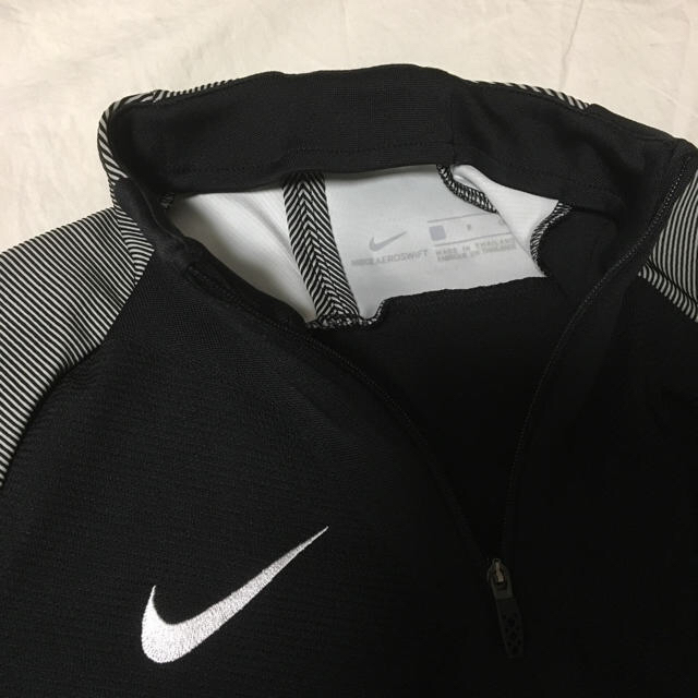 NIKE(ナイキ)のNIKE ナイキ エアロスイフト ドリルトップ ジャージ 値下げしました スポーツ/アウトドアのランニング(ウェア)の商品写真