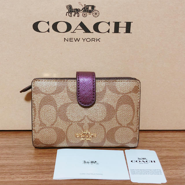 COACH(コーチ)の年末セール！新品☆COACH　折りたたみ　シグネチャー　紫　パープル メンズのファッション小物(折り財布)の商品写真