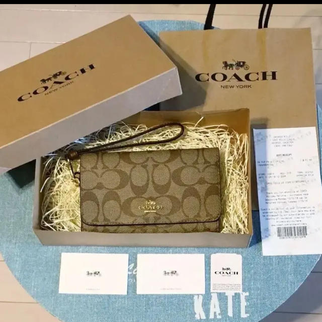 COACH - コーチ 新品未使用 iPhoneケース 二つ折り財布  スマホウォレットの通販 by kate's shop｜コーチならラクマ