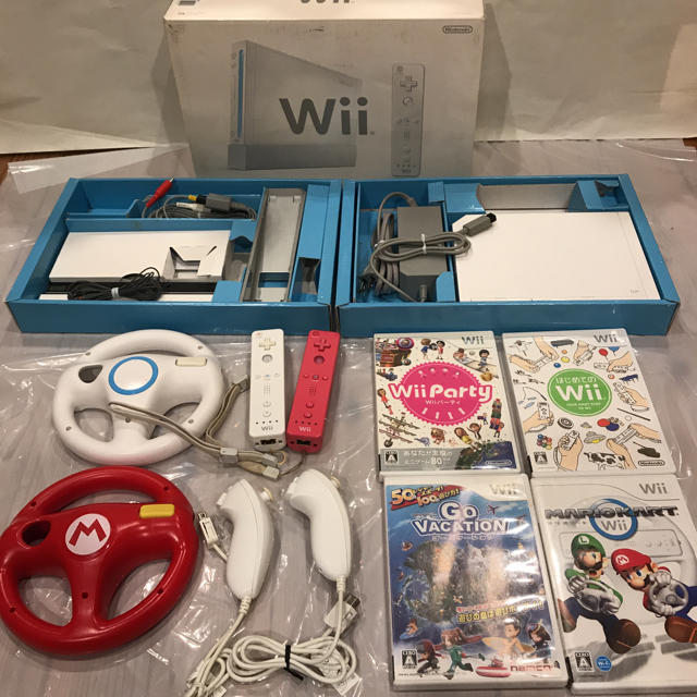 Wii(ウィー)のwii 本体 ソフト4枚 リモコン、ヌンチャク、ハンドル2個セット エンタメ/ホビーのゲームソフト/ゲーム機本体(家庭用ゲーム機本体)の商品写真