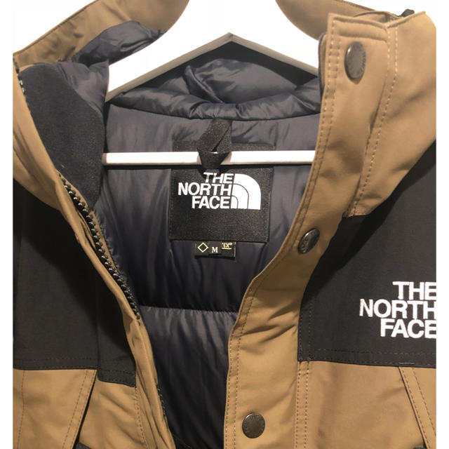 THE NORTH FACE(ザノースフェイス)のラスト1点！ 新品タグ付き正規店購入 マウンテンダウンジャケット ノースフェイス メンズのジャケット/アウター(ダウンジャケット)の商品写真