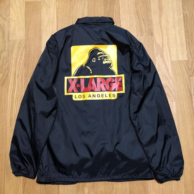 XLARGE(エクストララージ)のX-LARGE コーチジャケット S  黒 バックプリント メンズのジャケット/アウター(ナイロンジャケット)の商品写真