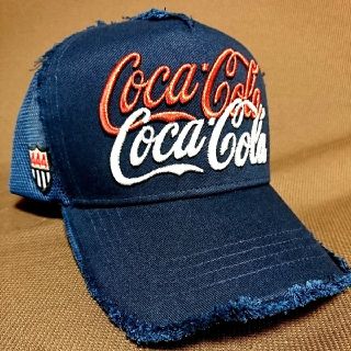 ヨシノリコタケ(YOSHINORI KOTAKE)の【YOSHINORI KOTAKE】ヨシノリコタケ×COCA-COLA  (キャップ)