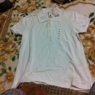 ユニクロ(UNIQLO)の白ポロシャツ(ポロシャツ)